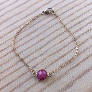 Dainty ruby and gold bracelet